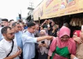 Sekjen Partai Gerindra Ahmad Muzani Mendampingi Cawapres Gibran Rakabuming Raka Saat Blusukan Di Pasar Natar Lampung Sabtu.webp.webp
