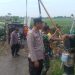 Antisipasi Banjir, Polsek Wanasari Bersinergi Kerja Bakti Membersihkan Saluran Air Desa Klampok