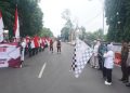 Ribuan Warga Batang Bentangkan Bendera Merah Putih dalam Haul Mbah Surgi